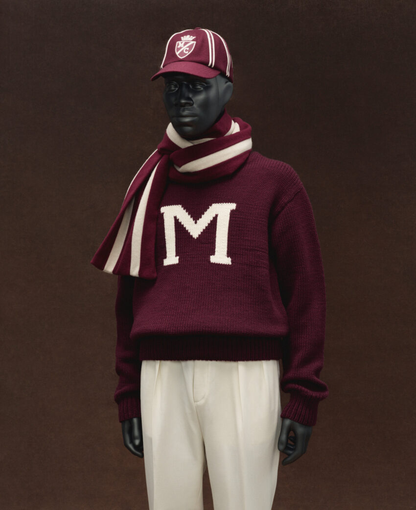 A mannequin modeling a preppy maroon-and-cream Ralph Lauren ensemble inspired by Morehouse College