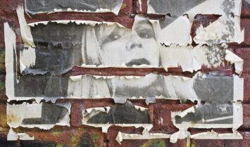 A weathered poster of Chelsea Manning