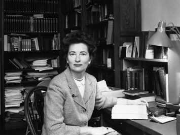 Portrait of Marie Borroff sitting at her desk