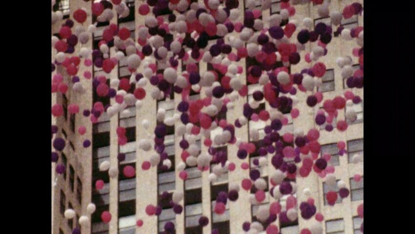 Release of pink and white balloons.