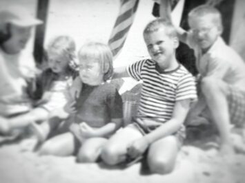 A photo of the author and her brother, with other children