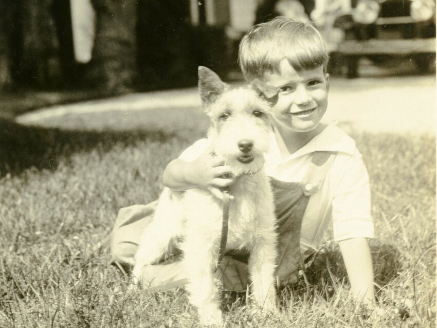 Young James Merrill with his pet terrier at "The Orchard" in 1930.