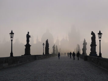 Charles Bridge in Prague covered in mist. Adapted from R. Boed / Creative Commons.