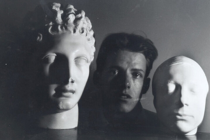 James Merrill with Mask of Keats and Bust of Hermes. Courtesy Washington University in St. Louis Special Collections.