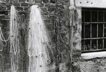 Fish nets hanging on a wall