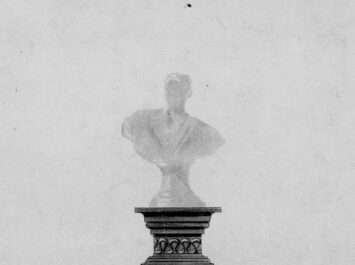 Plinth with a shadow of a bust on top