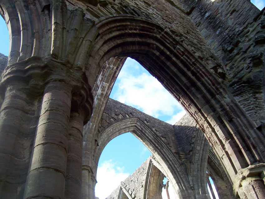 Detail of Tintern Abbey with sun shining through roof